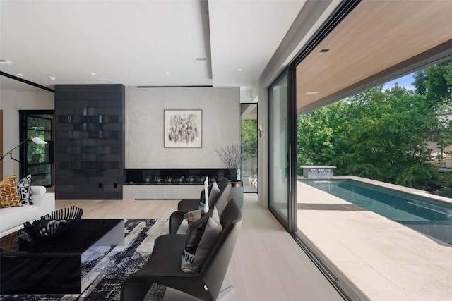 1115 Gillespie Pl, Austin, TX 78704 - living room featuring wood finished floors and healthy amount of natural light