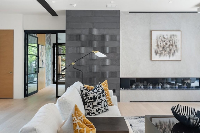 1115 Gillespie Pl, Austin, TX 78704 - living area featuring wood finished floors and recessed lighting