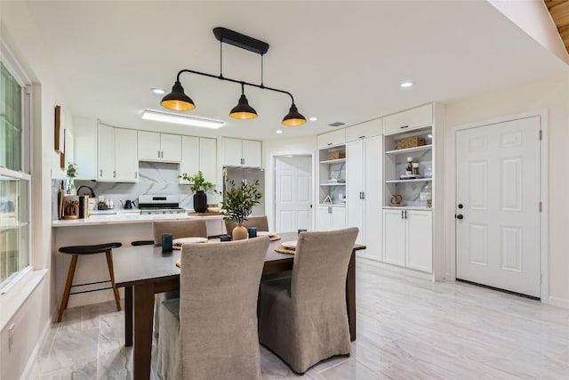 5403 Village Ln, Austin, TX 78744 - dining space with recessed lighting