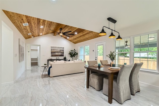 5403 Village Ln, Austin, TX 78744 - dining area featuring wooden ceiling, baseboards, lofted ceiling, a ceiling fan, and light marble finish floors