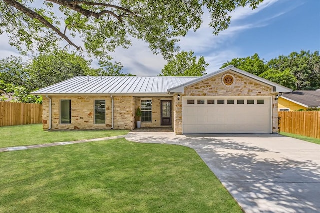 5403 Village Ln, Austin, TX 78744 - ranch-style home featuring driveway, a garage, a standing seam roof, stone siding, and metal roof