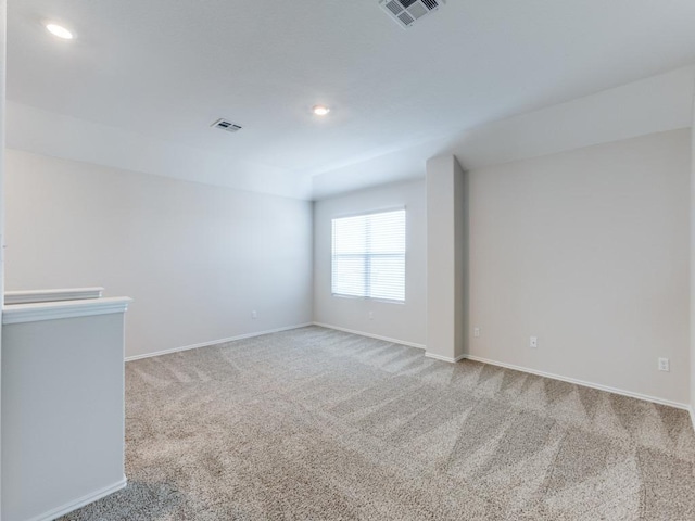 204 Magione St, Hutto, TX 78634 - spare room with carpet floors, baseboards, and recessed lighting