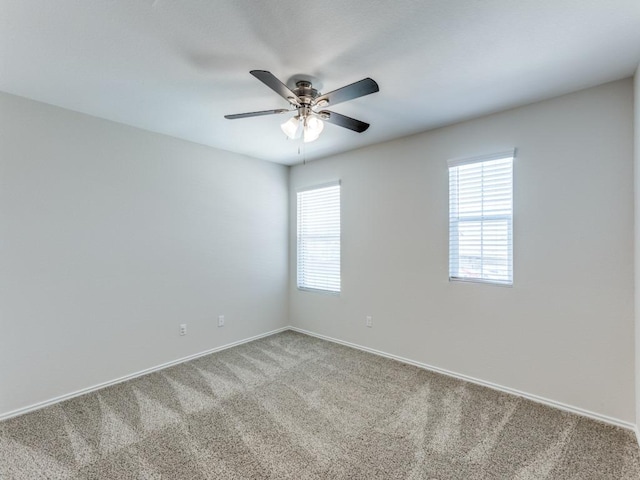 204 Magione St, Hutto, TX 78634 - carpeted empty room with baseboards and ceiling fan