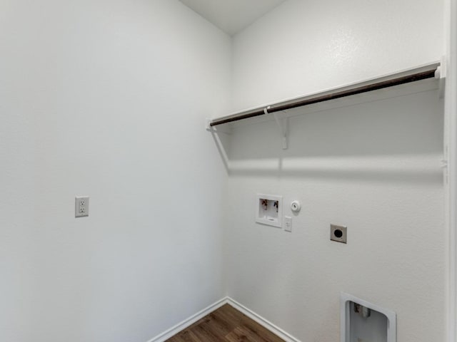 204 Magione St, Hutto, TX 78634 - laundry room with electric dryer hookup, gas dryer hookup, dark wood-style floors, hookup for a washing machine, and baseboards