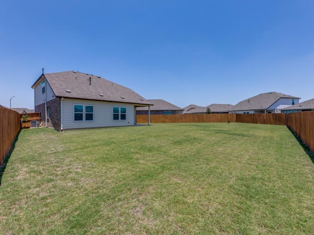 204 Magione St, Hutto, TX 78634 - rear view of property with brick siding