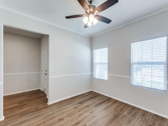 204 Magione St, Hutto, TX 78634 - unfurnished room with light wood-style floors, ornamental molding, baseboards, and a ceiling fan
