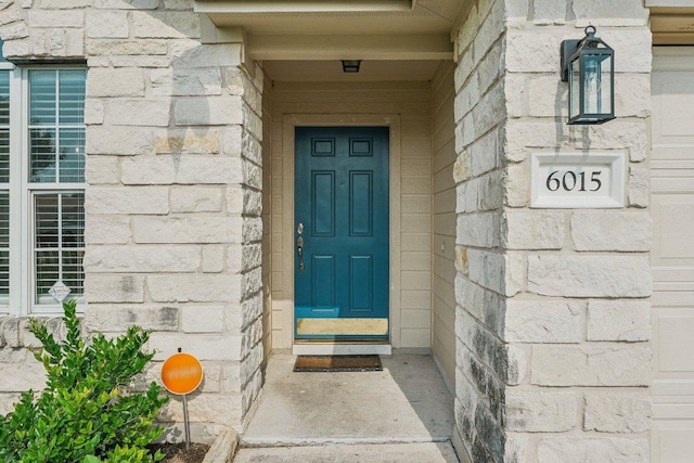 6015 Lone Star Ct, Hutto, TX 78634 - entrance to property featuring stone siding