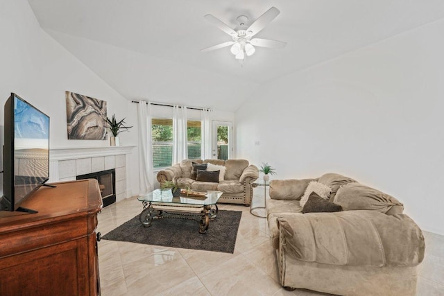 6015 Lone Star Ct, Hutto, TX 78634 - living room featuring lofted ceiling, ceiling fan, and a fireplace
