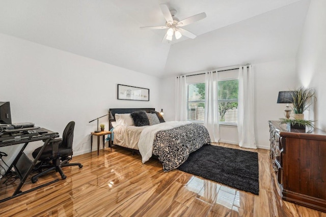 6015 Lone Star Ct, Hutto, TX 78634 - bedroom featuring lofted ceiling, light wood-type flooring, a ceiling fan, and an office area