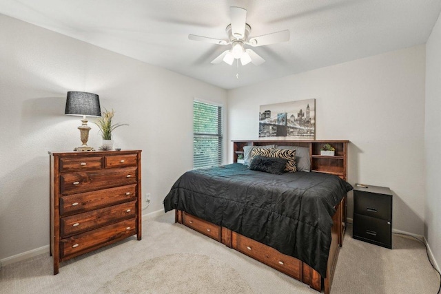 6015 Lone Star Ct, Hutto, TX 78634 - bedroom featuring carpet, baseboards, and a ceiling fan