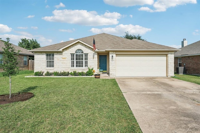 6015 Lone Star Ct, Hutto, TX 78634 - ranch-style house with a front lawn, driveway, an attached garage, and a shingled roof