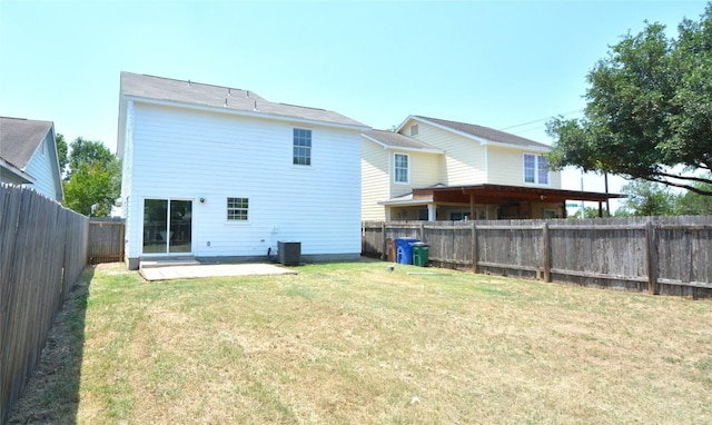 1902 Tranquilo Trl, Austin, TX 78744 - back of property with a patio and central air condition unit