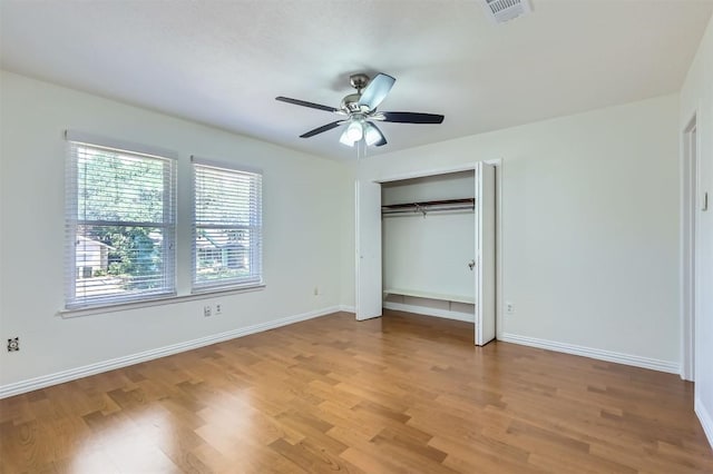 11619 Birchbark Trl, Austin, TX 78750 - unfurnished bedroom featuring light wood-style floors, baseboards, and a closet