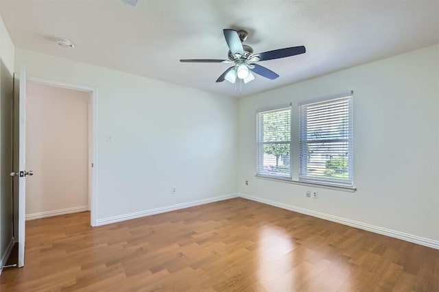 11619 Birchbark Trl, Austin, TX 78750 - spare room with light wood-style flooring, baseboards, and a smoke detector