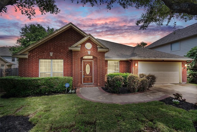 15617 Staffordshire Ln, Austin, TX 78717 - traditional-style house featuring brick siding, driveway, a garage, a front lawn, and roof with shingles
