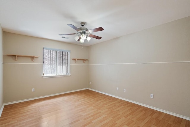 15617 Staffordshire Ln, Austin, TX 78717 - empty room featuring light wood-type flooring, ceiling fan, and baseboards