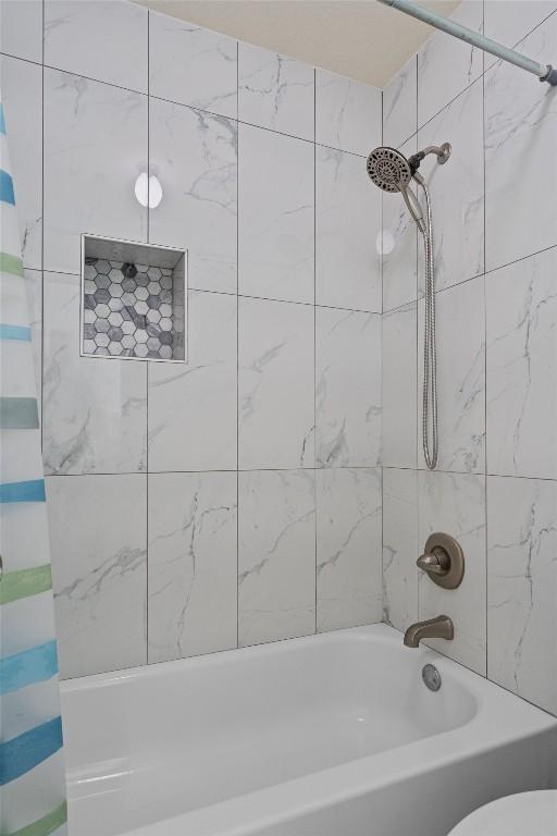 15617 Staffordshire Ln, Austin, TX 78717 - bathroom with shower / bath combination with curtain and toilet