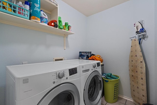 15617 Staffordshire Ln, Austin, TX 78717 - laundry area featuring washer and dryer and light tile patterned floors