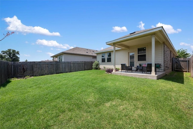 212 Canis St, Georgetown, TX 78628 - rear view of property with a patio area