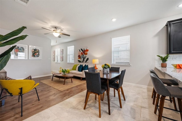 212 Canis St, Georgetown, TX 78628 - dining room with a ceiling fan, baseboards, and recessed lighting