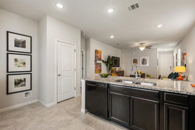 212 Canis St, Georgetown, TX 78628 - kitchen with black dishwasher, a sink, ceiling fan, light stone countertops, and open floor plan
