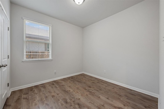 212 Canis St, Georgetown, TX 78628 - unfurnished room featuring wood finished floors and baseboards