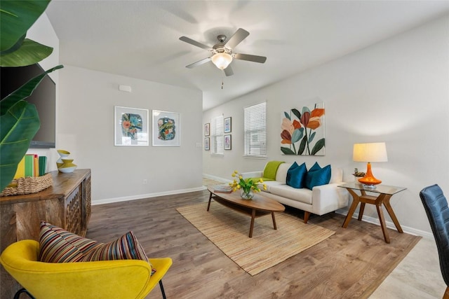 212 Canis St, Georgetown, TX 78628 - living room with a ceiling fan, baseboards, and wood finished floors