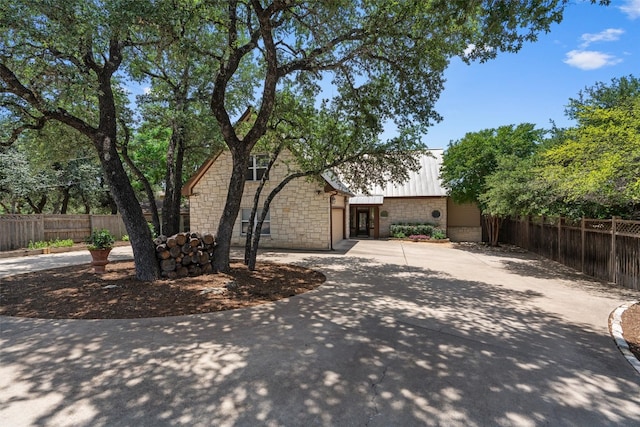 17505 E Darleen Dr, Leander, TX 78641 - view of front of property featuring concrete driveway and stone siding