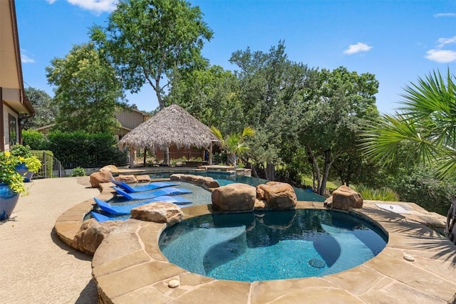 17505 E Darleen Dr, Leander, TX 78641 - view of swimming pool featuring a gazebo, a patio area, and a pool with connected hot tub