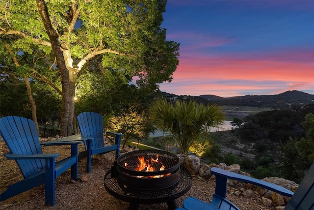 17505 E Darleen Dr, Leander, TX 78641 - view of yard featuring an outdoor fire pit and a mountain view