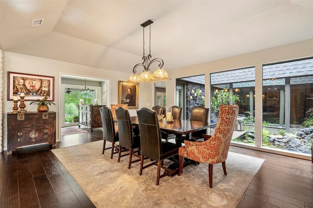 2924 Gabriel View Dr, Georgetown, TX 78628 - dining room featuring a chandelier, hardwood / wood-style floors, and vaulted ceiling