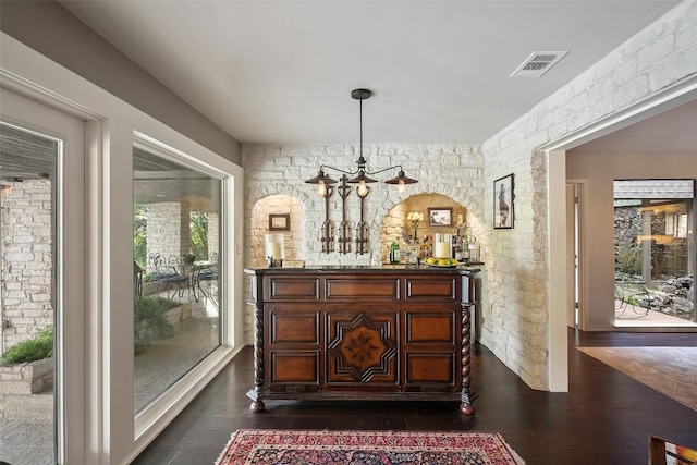 2924 Gabriel View Dr, Georgetown, TX 78628 - dining area featuring dark wood-style flooring and a chandelier