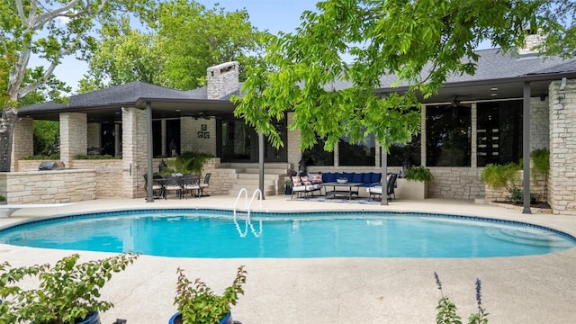 2924 Gabriel View Dr, Georgetown, TX 78628 - swimming pool featuring a ceiling fan, an outdoor living space, a patio area, and a diving board