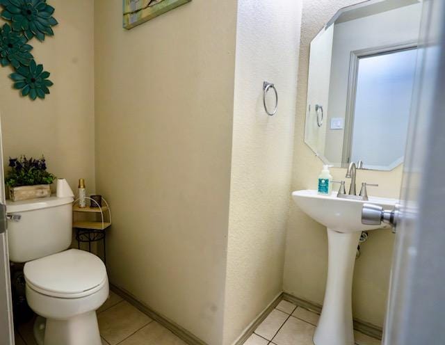 1406 Apache Cv, Pflugerville, TX 78660 - half bath featuring tile patterned floors and toilet