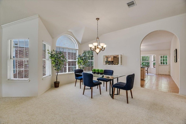 10902 Sierra Oaks, Austin, TX 78759 - carpeted dining space with arched walkways, a chandelier, baseboards, and lofted ceiling