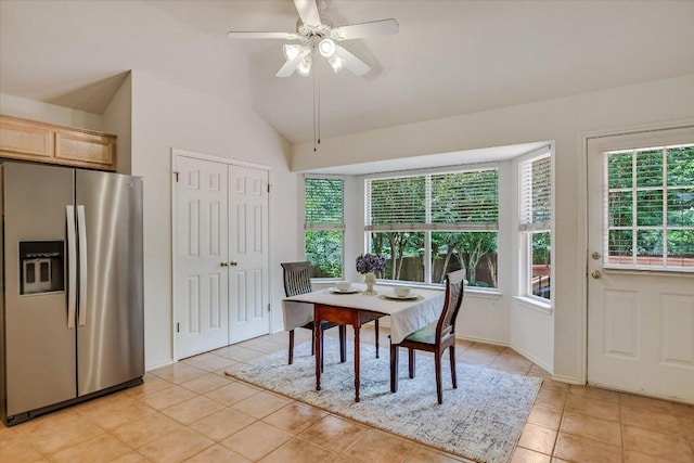 10902 Sierra Oaks, Austin, TX 78759 - dining space featuring light tile patterned flooring, lofted ceiling, and ceiling fan