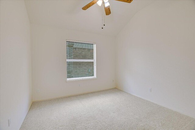 10902 Sierra Oaks, Austin, TX 78759 - unfurnished room featuring carpet floors, a ceiling fan, and vaulted ceiling