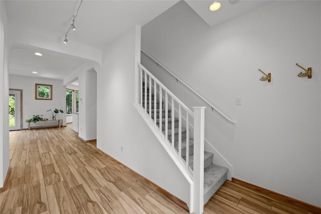 504 Tyree Rd, Cedar Park, TX 78613 - stairway with wood finished floors, rail lighting, and recessed lighting