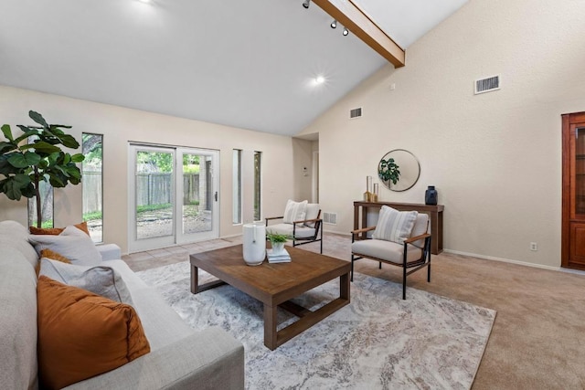 8126 Greenslope Dr, Austin, TX 78759 - living room with high vaulted ceiling, beamed ceiling, light carpet, and baseboards