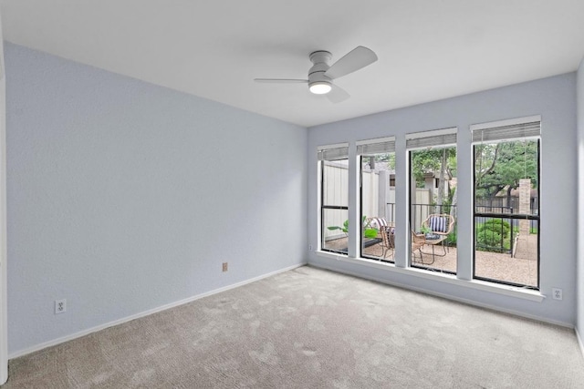 8126 Greenslope Dr, Austin, TX 78759 - carpeted spare room featuring a ceiling fan and baseboards