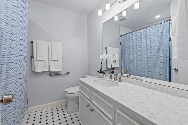 8126 Greenslope Dr, Austin, TX 78759 - bathroom with baseboards, toilet, vanity, a shower with shower curtain, and tile patterned floors