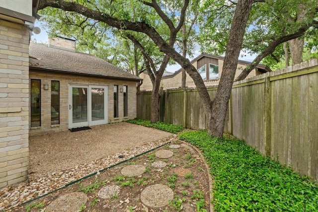 8126 Greenslope Dr, Austin, TX 78759 - fenced backyard featuring a patio area