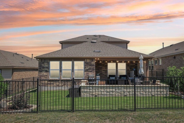 709 Kitty Hawk Rd, Georgetown, TX 78633 - back of property featuring a patio area, a shingled roof, and brick siding