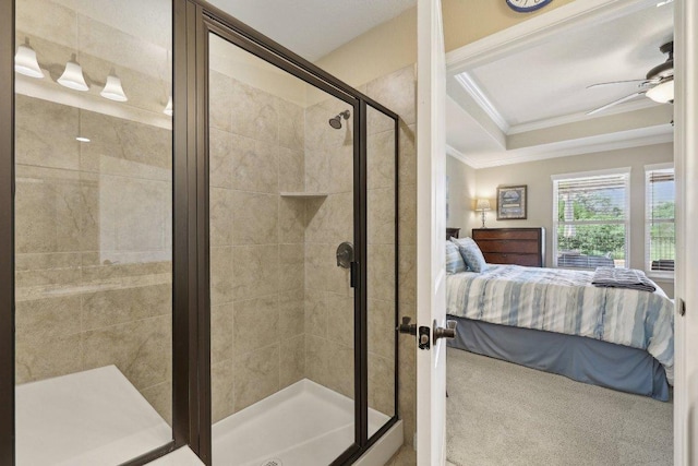 709 Kitty Hawk Rd, Georgetown, TX 78633 - bathroom featuring connected bathroom, crown molding, a ceiling fan, a shower stall, and a tray ceiling