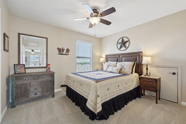 709 Kitty Hawk Rd, Georgetown, TX 78633 - bedroom featuring light colored carpet, baseboards, and ceiling fan