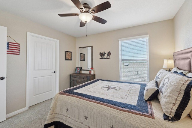 709 Kitty Hawk Rd, Georgetown, TX 78633 - bedroom with light carpet, a ceiling fan, and baseboards
