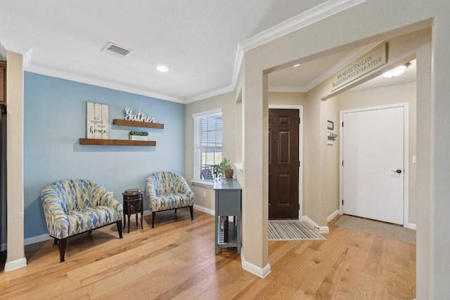709 Kitty Hawk Rd, Georgetown, TX 78633 - entryway with crown molding, light wood-style flooring, baseboards, and recessed lighting