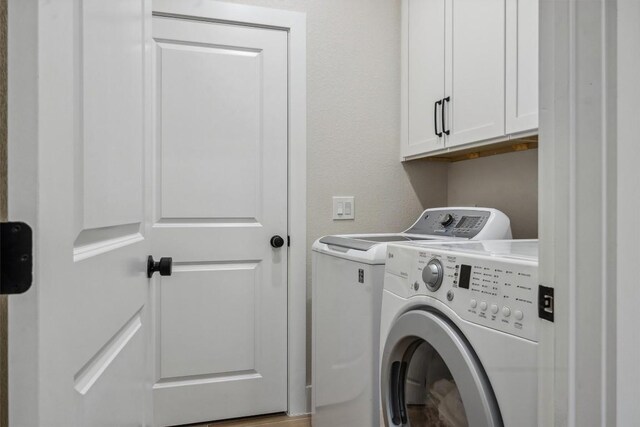 2 Basswood Cir, Wimberley, TX 78676 - laundry room with washing machine and clothes dryer and cabinet space