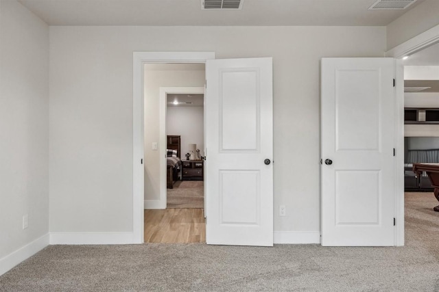 2 Basswood Cir, Wimberley, TX 78676 - unfurnished bedroom with carpet flooring and baseboards
