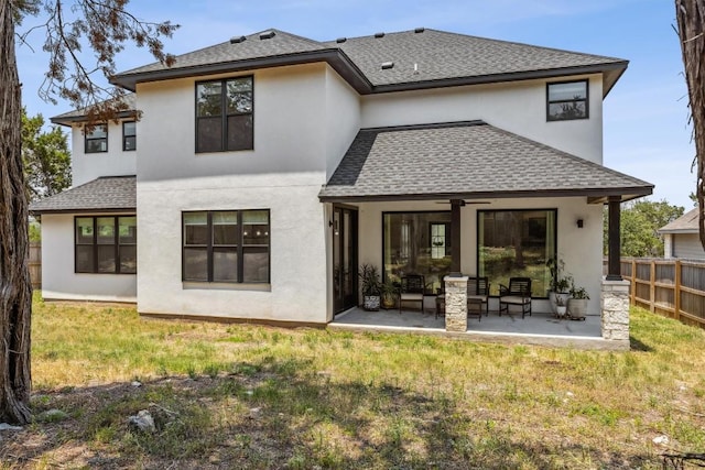 2 Basswood Cir, Wimberley, TX 78676 - rear view of property featuring roof with shingles, a ceiling fan, stucco siding, and a patio